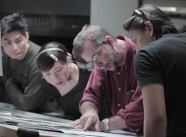 David Hartung performs a press check on his book, Macau: Work in Progress.